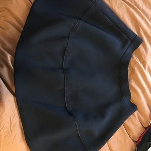 A-line, flared skirt with gold zip in the back.